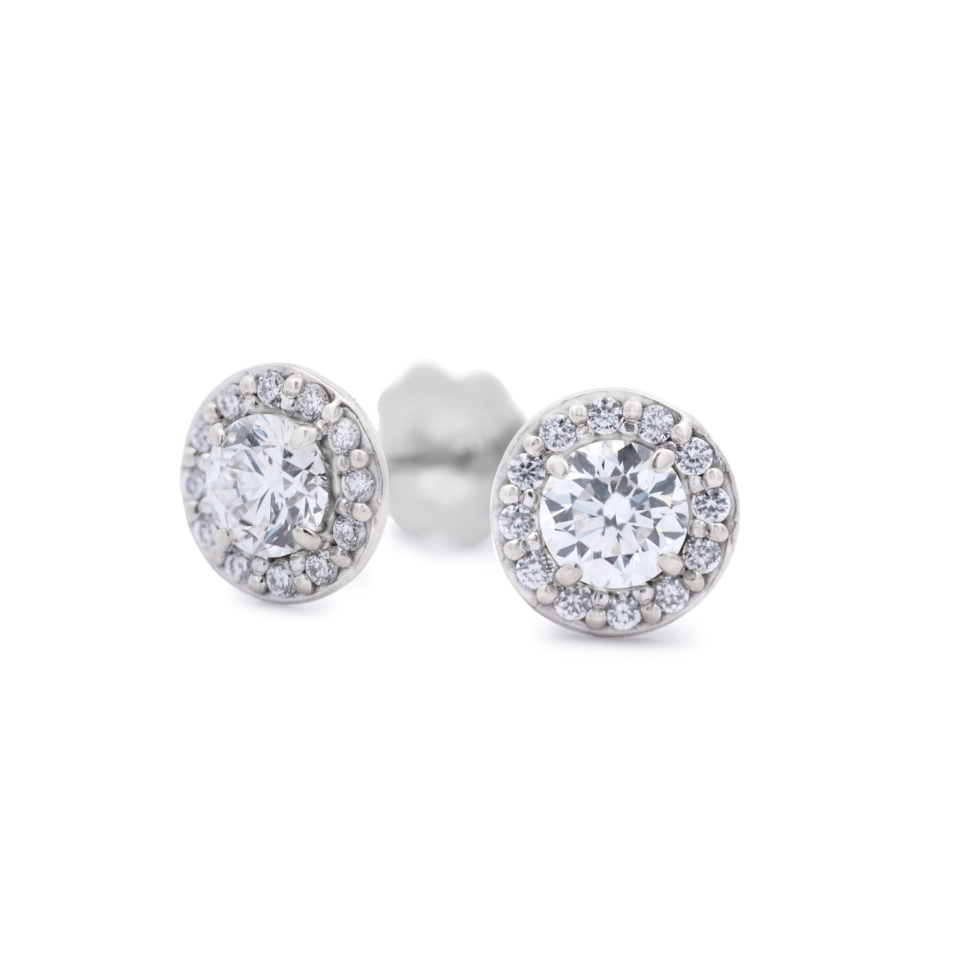 Brilliant cut diamond halo stud earrings in 14ct white gold
