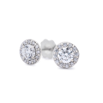 Brilliant cut diamond halo stud earrings in 14ct white gold
