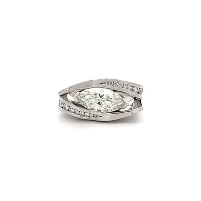 Changing Faces: Marquise Cut Diamond Cluster Ring in Platinum