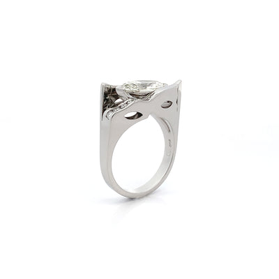 Changing Faces: Marquise Cut Diamond Cluster Ring in Platinum