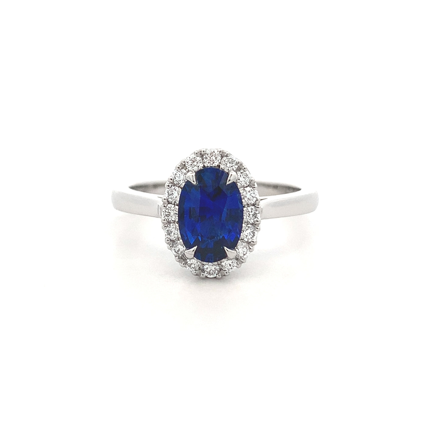 Luminous: Oval Cut Sapphire and Diamond Halo Ring in Platinum | 1.31ct