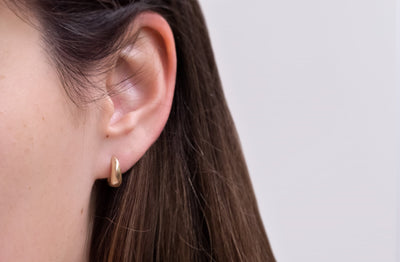 Tapered Huggie Earrings in Gold