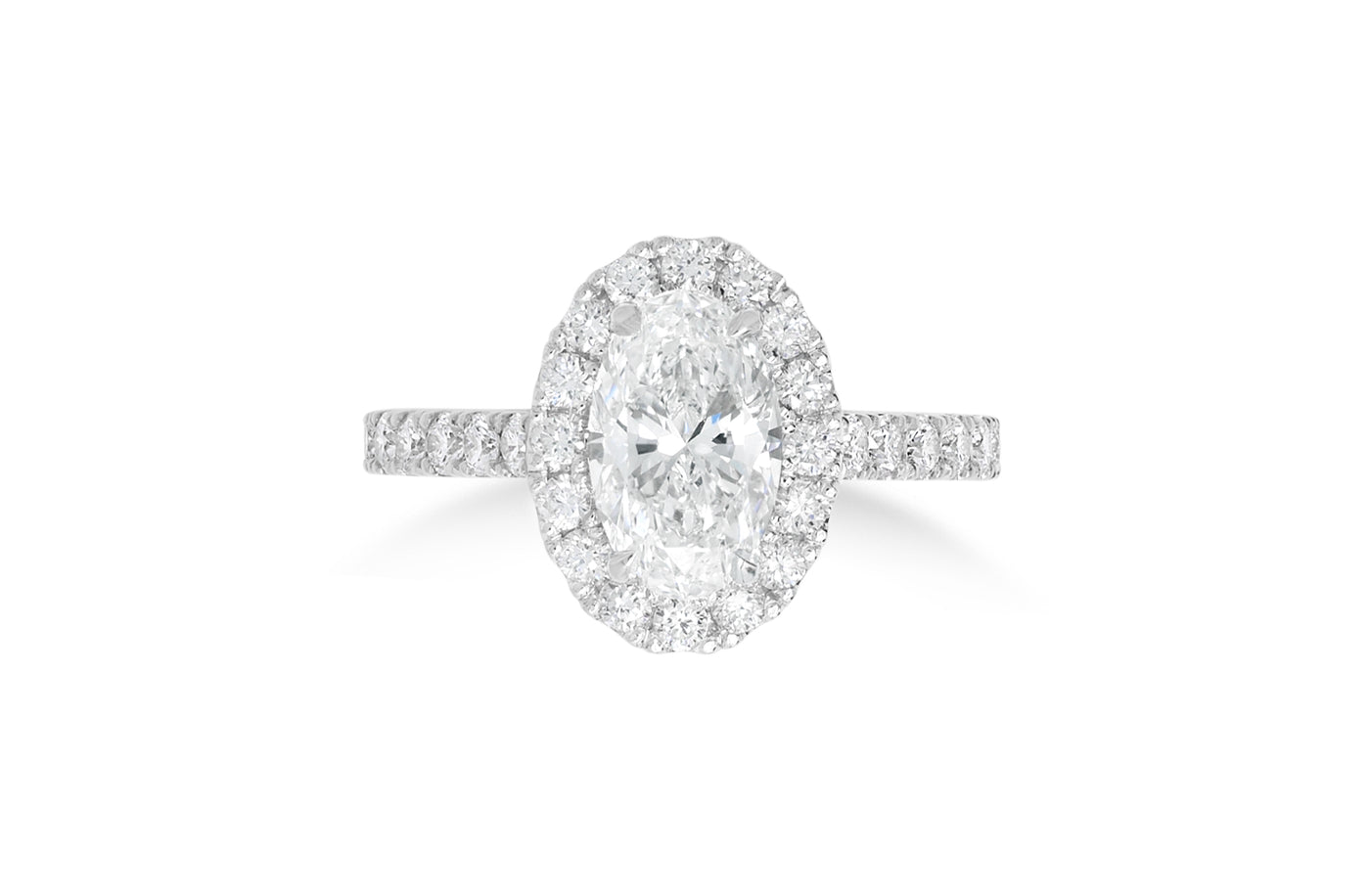 Adorn: Oval Cut Diamond Halo Ring with Diamond Set Band in White Gold or Platinum