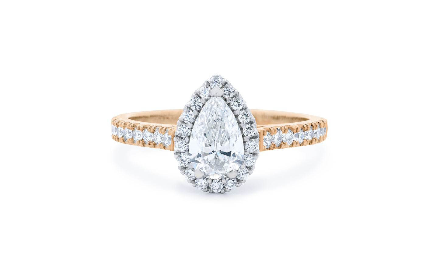 Adorn: Pear Cut Diamond Halo Ring in rose gold and platinum