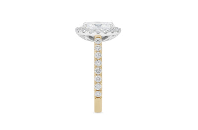 Adorn: Oval Cut Diamond Halo Ring with Diamond Set Band