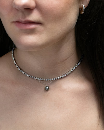 Tahitian Black Pearl Pendant in White Gold
layered with natural diamond tennis necklace