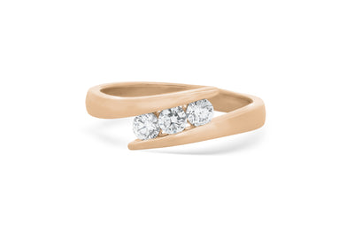 Embrace: Brilliant Cut Diamond Three Stone Ring