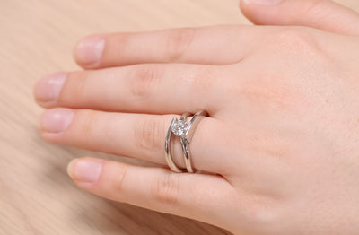 Infinity Delicate: Brilliant Cut Diamond Solitaire Ring