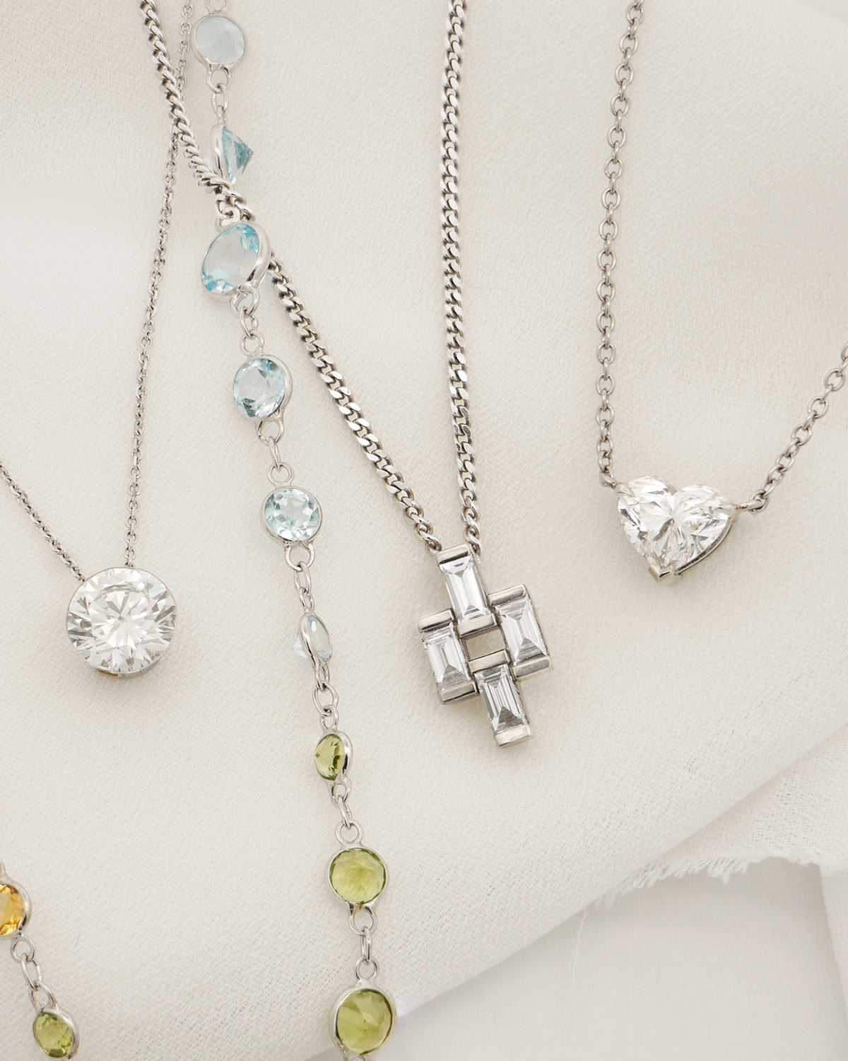 Floeting® Diamond Necklace, Heart Cut Diamond Pendant, Emerald Cut Cluster Pendant and Coloured Gemstone Necklace in White Gold