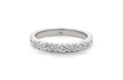 X's and O's Brilliant Cut Diamond Eternity Ring