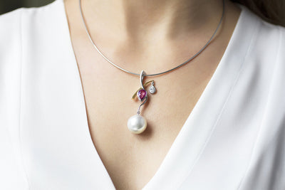 Pendulum of Time: Diamond, Sapphire and Pearl Pendant