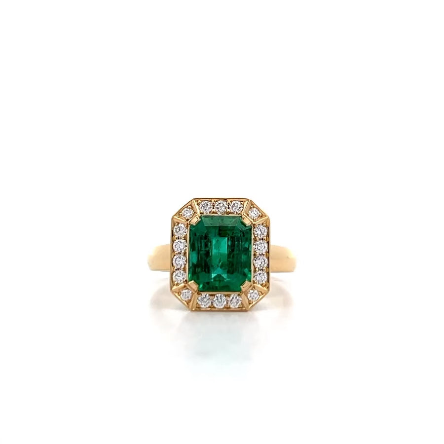 Emerald and Diamond Halo Ring in Yellow Gold | 3.90ctw
