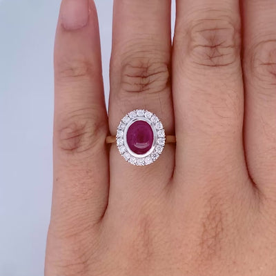 Cabochon Cut Ruby and Diamond Halo Ring in Yellow Gold | 2.26ctw