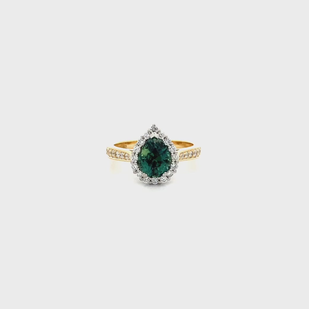 In a Pear Tree: Teal Sapphire and Diamond Halo Ring