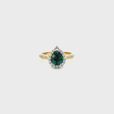 In a Pear Tree: Teal Sapphire and Diamond Halo Ring