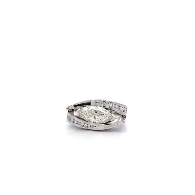 Changing Faces: Marquise Cut Diamond Cluster Ring in Platinum
