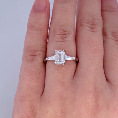 Nouveau: Emerald Cut & Tapered Baguette Diamond Three Stone Ring in Platinum | 1.73ctw