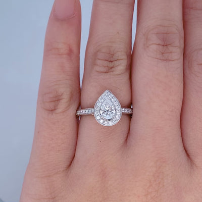 Pear Cut Diamond Halo Ring with Diamond Shoulders in Platinum