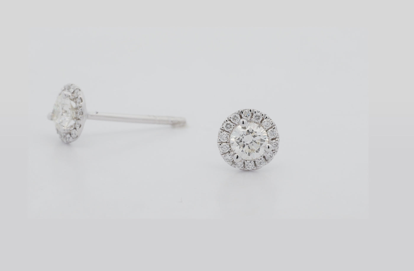 Brilliant Cut Halo Diamond Stud Earrings in White Gold | 0.50ctw