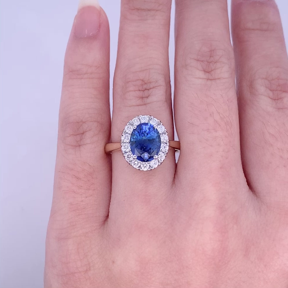 Midnight Bloom: Sapphire & Diamond Halo Ring in Yellow Gold | 2.55ct