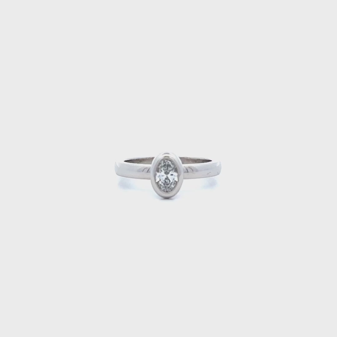 Bezel Set Oval Cut Diamond Solitaire Ring in Platinum | 0.50ct F VS1