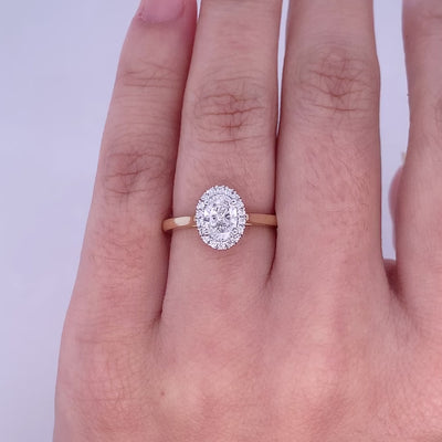 Luminous: Oval Cut Diamond Halo Ring in Yellow Gold | 0.68ctw