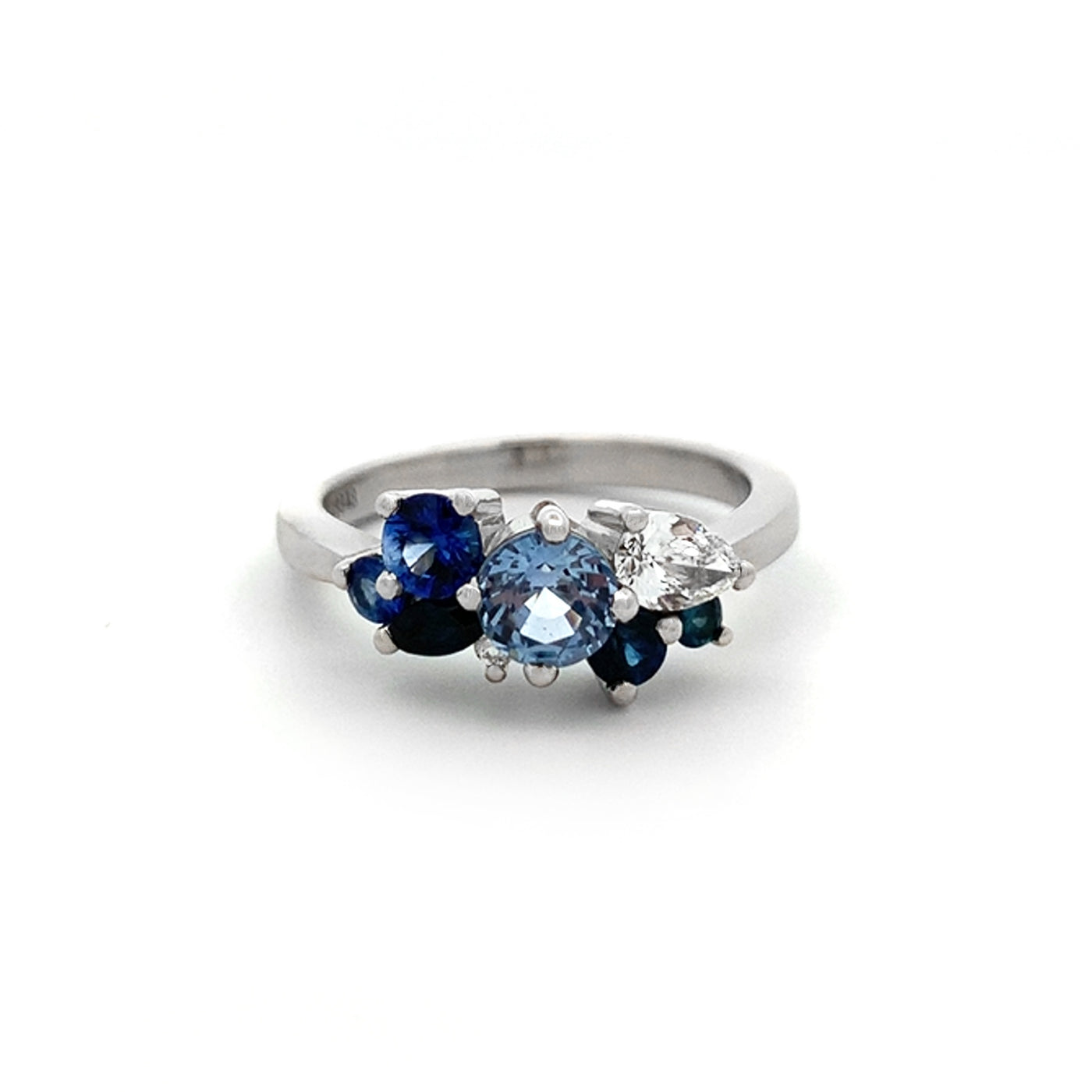 Blue Enchanted Forest: Sapphire & Diamond Cluster Ring in Platinum