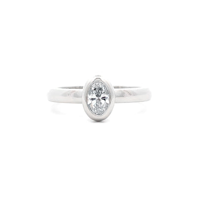 Bezel Set Oval Cut Diamond Solitaire Ring in Platinum | 0.50ct F VS1