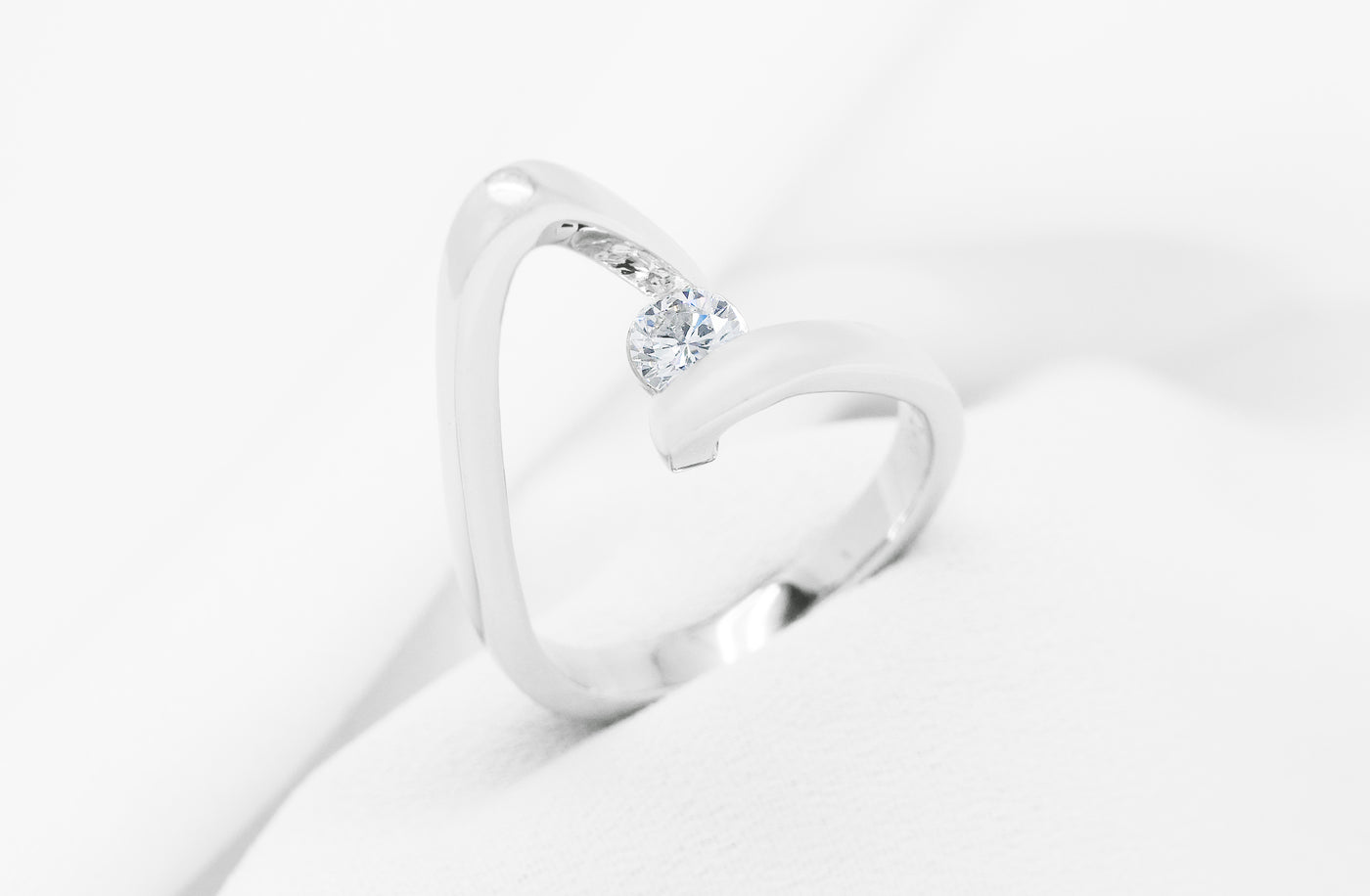 Ribbond: Brilliant Cut Diamond Solitaire Ring in Platinum | 0.29ct