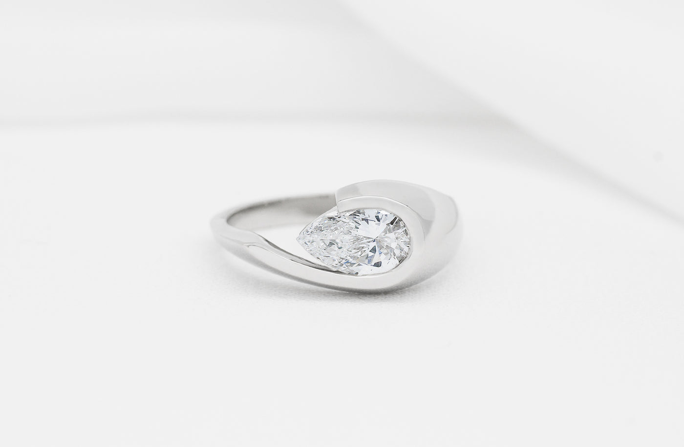 Inspired Collection, Diamond Ring, Jewellery, Jewelry, ring design, specialist, Platinum, 18k, 18ct, white gold, Maori, Polynesian, pear shaped diamond, ready to ship, to go, 1ct, E colour, color, VVS2 clarity