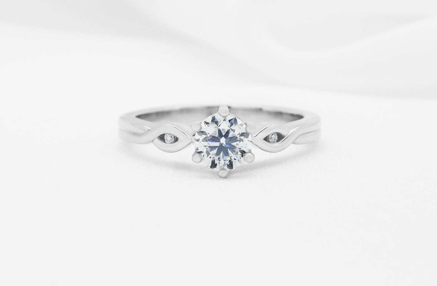 Takai: Brilliant Cut Diamond Solitaire Ring in Platinum | 0.712ctw