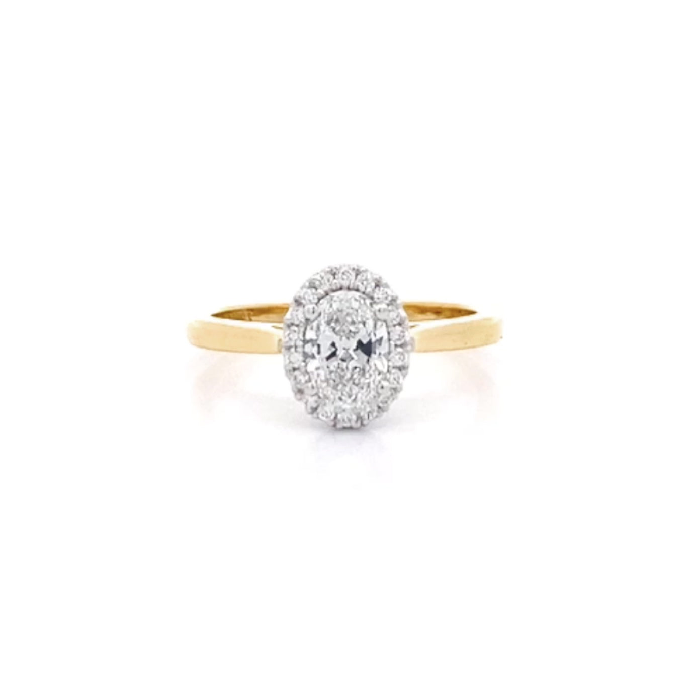 Luminous: Oval Cut Diamond Halo Ring in Yellow Gold | 0.68ctw