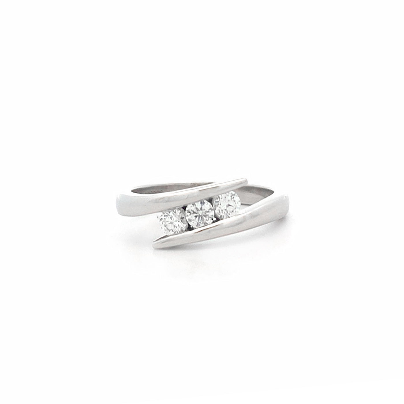Embrace: Brilliant Cut Diamond Three Stone Ring in Platinum | 0.30ctw