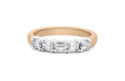 Emerald Cut Diamond Claw Set Ring in 18ct rose gold and platinum.