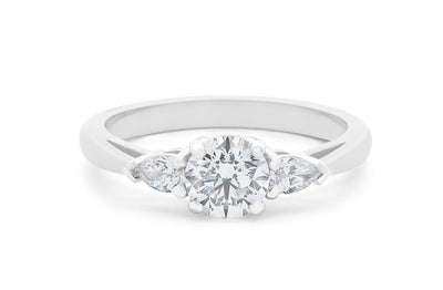 Reflect: Brilliant Cut Diamond Three Stone Ring