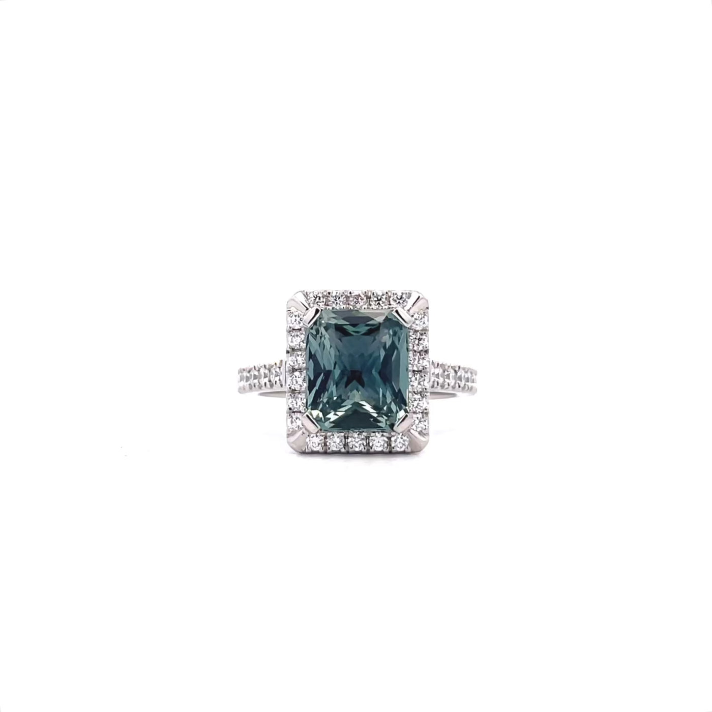 Teal Sapphire and Diamond Halo Ring