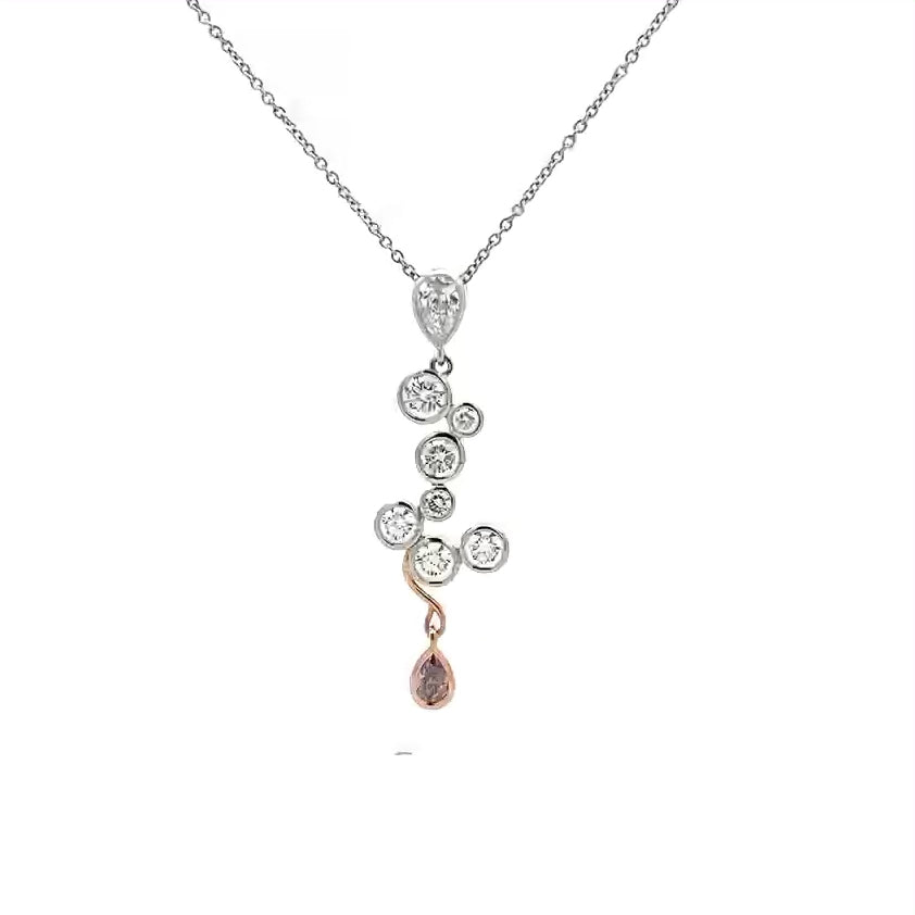 Mummmm: Diamond and Pink Diamond Pendant in Platinum | 1.32ctw.