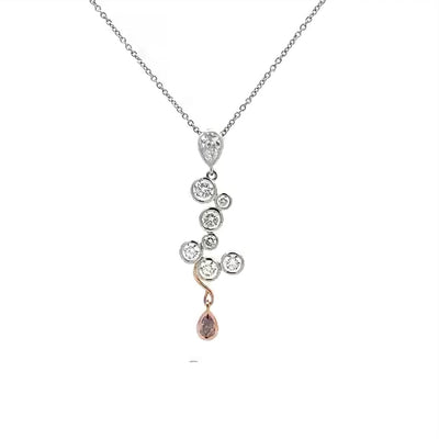 Mummmm: Diamond and Pink Diamond Pendant in Platinum | 1.32ctw.