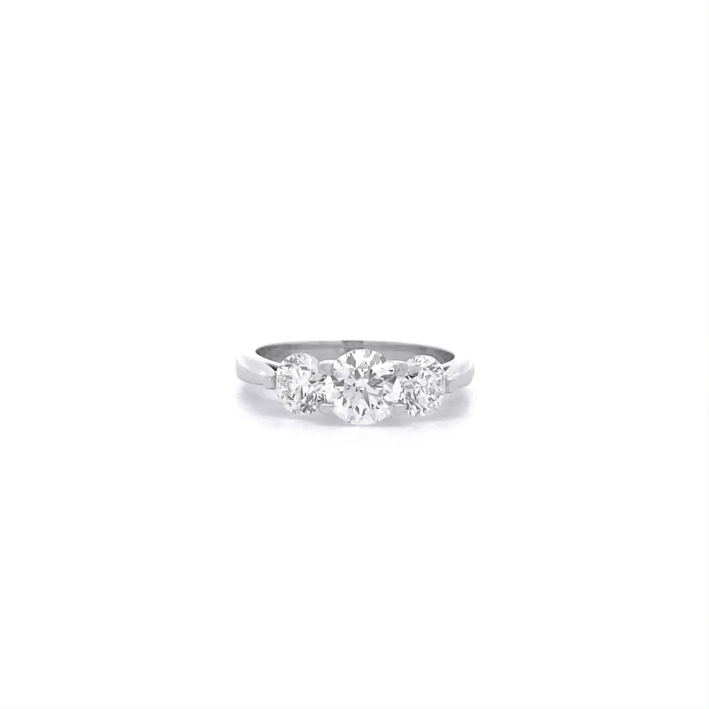 Lotus: Brilliant Cut Diamond Three Stone Ring