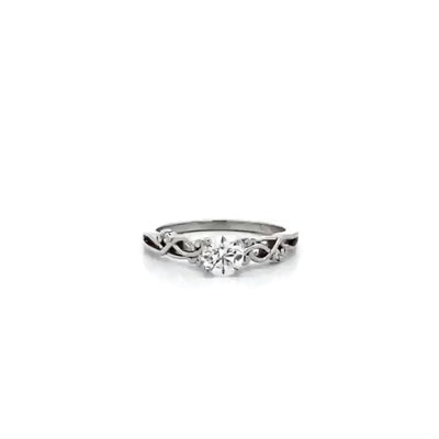Traces: Brilliant Cut Diamond Solitaire Ring in Platinum | 0.53ctw