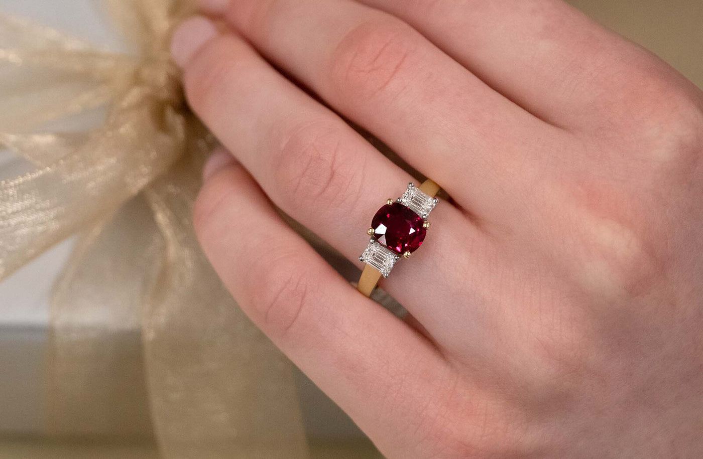 Vermilion: Cushion Cut Ruby and Emerald Cut Diamond Three Stone Ring