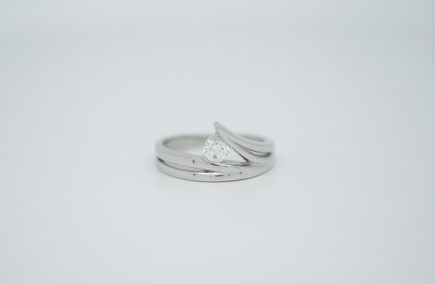 Inspired Collection, Waved, Wavey, Waves, ocean, surf, surfer, Platinum, 18k, 18ct White gold, brilliant cut, round cut, specialist, contemporary, modern, jewellery, jewelry, engagement ring, ring design, inspired design, tension setting, delicate, 360 video